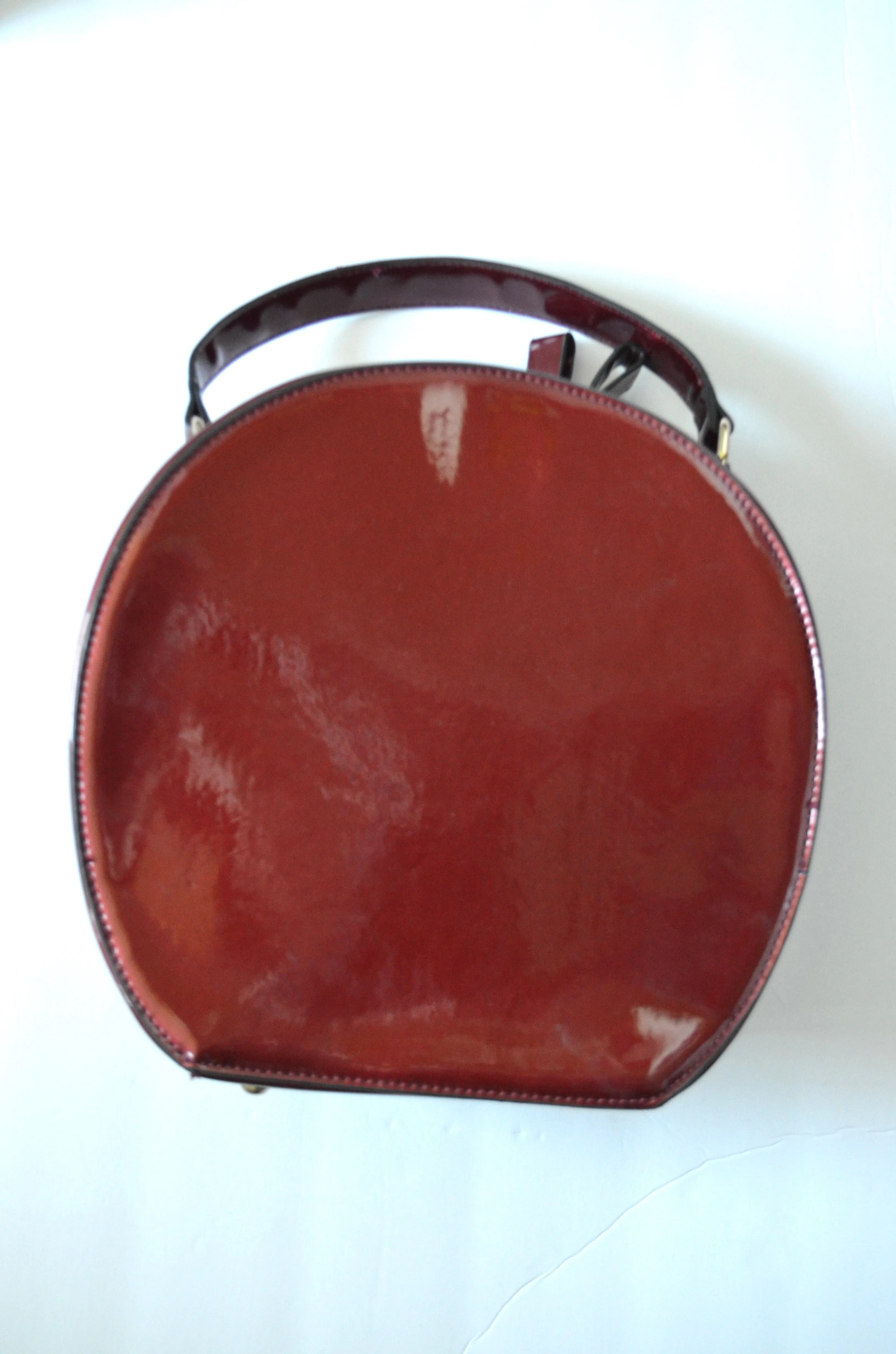 Round travel train case patent vegan leather merlot make up accessory case  purse Carry On